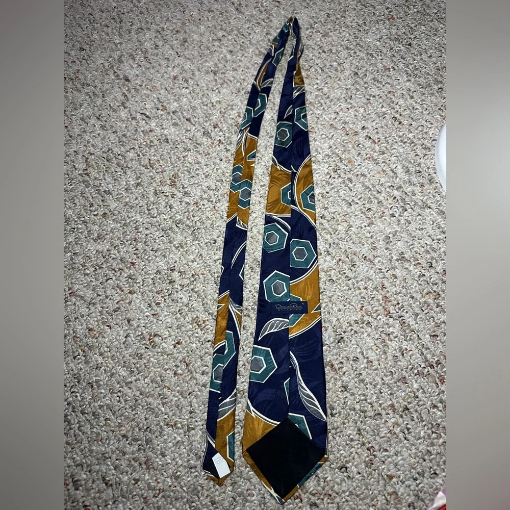 Two (2) Oscar De La Renta 100% silk patterned ties